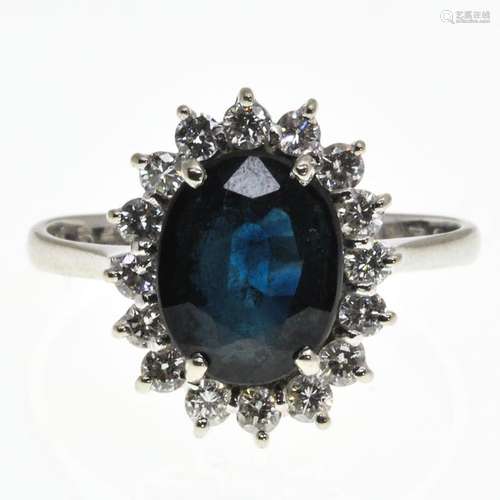 A Ladies Princess Di Diamond and Sapphire Ring