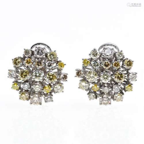 A Pair of 18KG Diamond Earrings