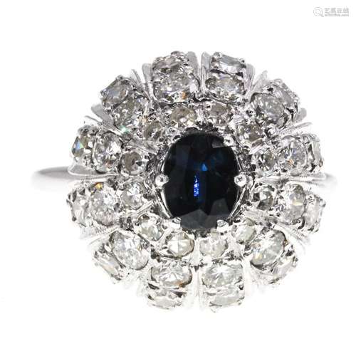 A Ladies 14KG Diamond and Sapphire Ring