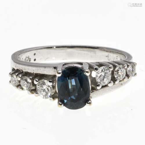 A Ladies 18KWG Sapphire and Diamond Ring