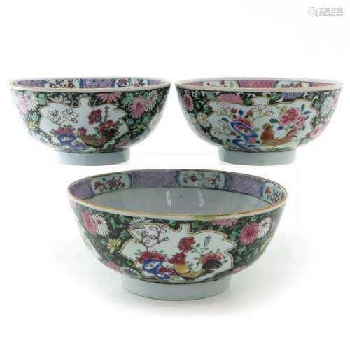 A Series of Three Yongzheng Famille Noir Bowls