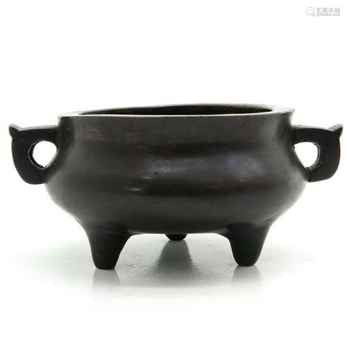 A Bronze Ming Period Tripod Censer