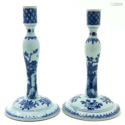 A Pair of Blue and White Candlesticks