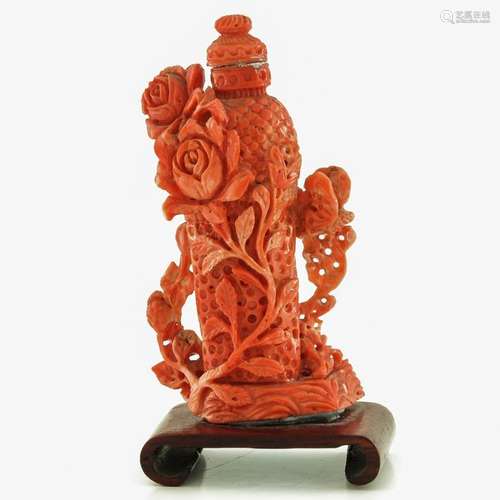 A Carved Red Coral Snuff Bottle