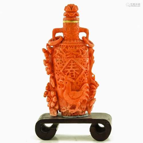 A Carved Red Coral Snuff Bottle