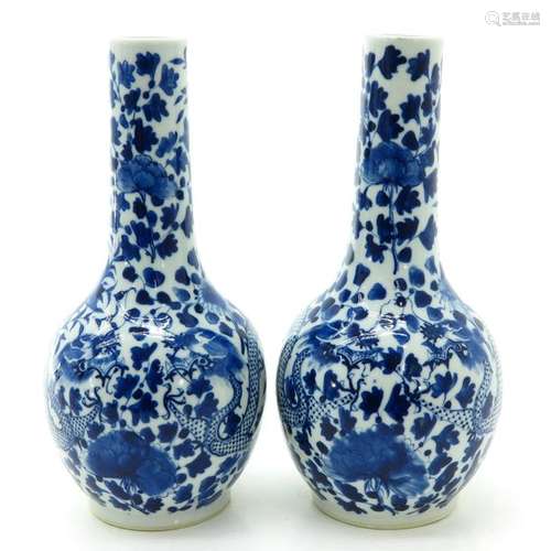 A Pair of Blue and White Bottle Vases