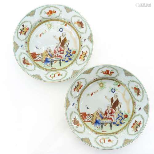 A Pair of Polychrome Decor Plates