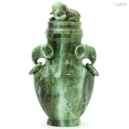 A Carved Jade Vase with Cover