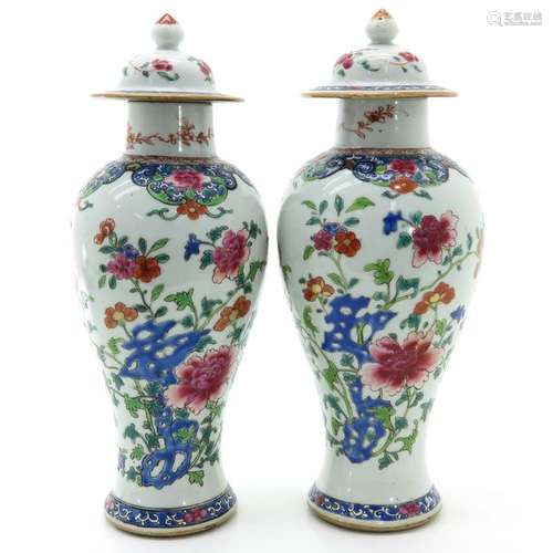 A Pair of Famille Rose Garniture Vases