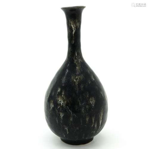 A Black and Brown Glazed Vase