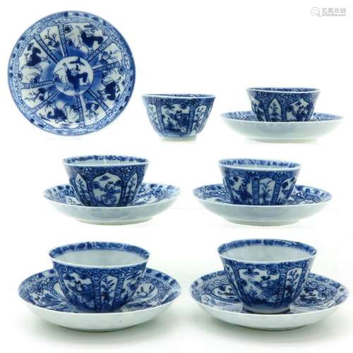 Six Blue and White Cups and Saucers