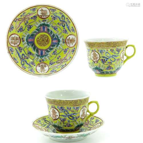 A Pair of Jaune Decor Cups and Saucers