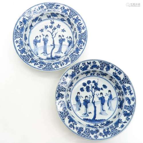 Two Blue and White Decor Chargers