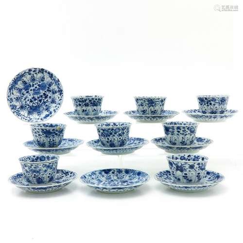 A Collection of Blue and White Cups and Saucers