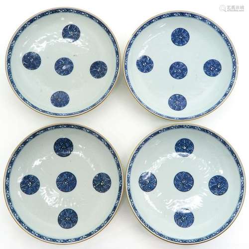 A Series of Four Blue and White Plates