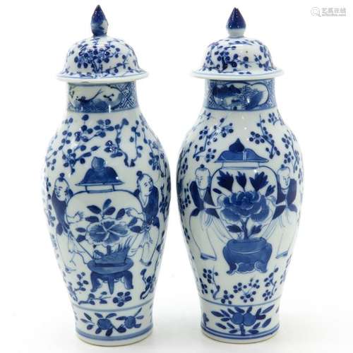 A Pair of Covered Vases