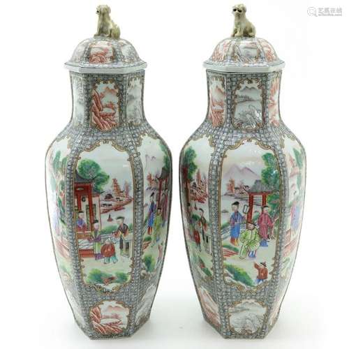 A Pair of Mandarin Decor Covered Vases