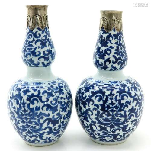 A Pair of Blue and White Gourd Vases