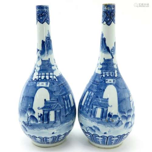 A Pair of Blue and White Bottle Vases