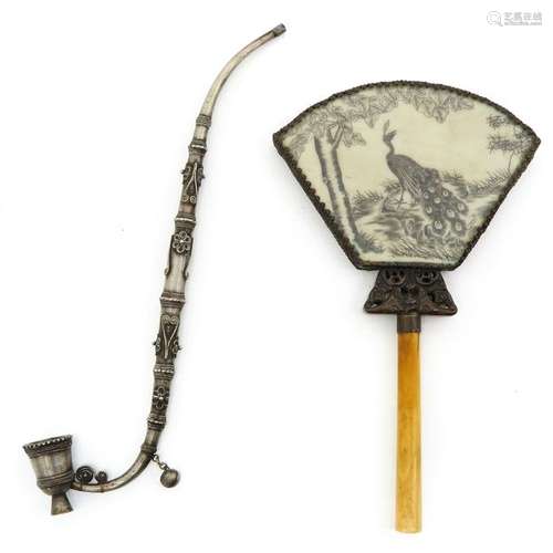 A Chinese Smoking Pipe and Mirror