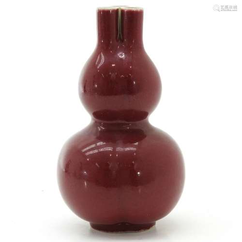 A Small Sang de Boeuf Decor Vase