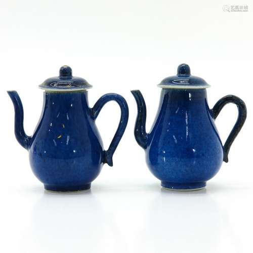 A Pair of Blue and Gilt Teapots