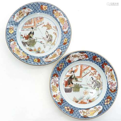 A Pair of Polychrome and Gilt Decor Plates