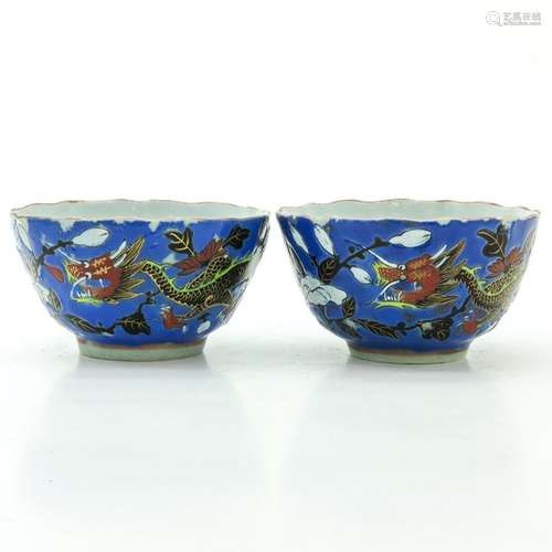 A Pair of Polychrome Decor Cups