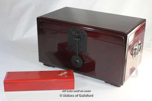 A South Korean lacquer box, hinged lid opening to reveal a lift out tray, with carrying handles,