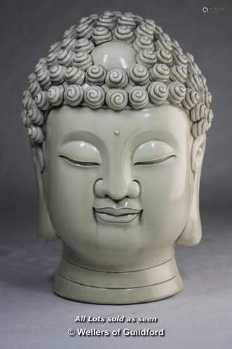 A Chinese blanc-de-chine portrait bust of Buddha, impressed mark to back of neck, 28cm.