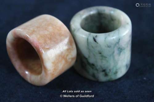 Two Chinese hardstone thumb rings.