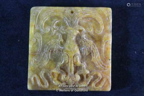 A Chinese square hardstone pendant carved with a phoenix, 5cm.