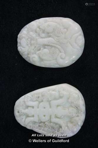 Two Chinese white hardstone pendants.