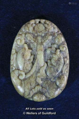 A Chinese carved hardstone pendant.