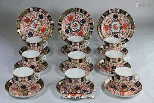 Crown Derby imari pattern, set of nine cups and saucers, three tea plates.