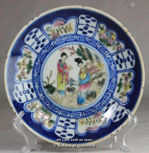 A Chinese plate painted with figures in a garden, four character mark to base, 19cm diameter.