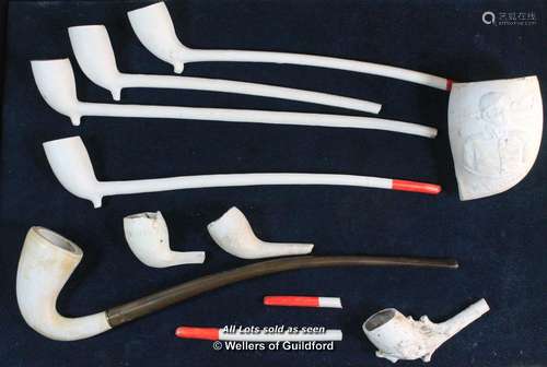 A quantity of clay pipes.