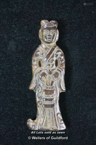 A Chinese hardstone pendant carved as a standing figure, 8cm.