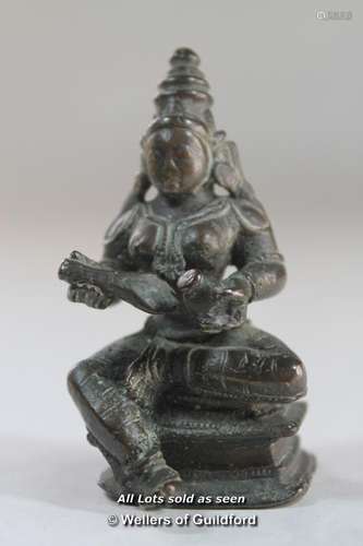 A South East Asian small bronze statuette of a goddess, 7cm.