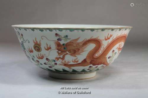 A Chinese bowl painted with orange dragon on cream ground, 9cm.