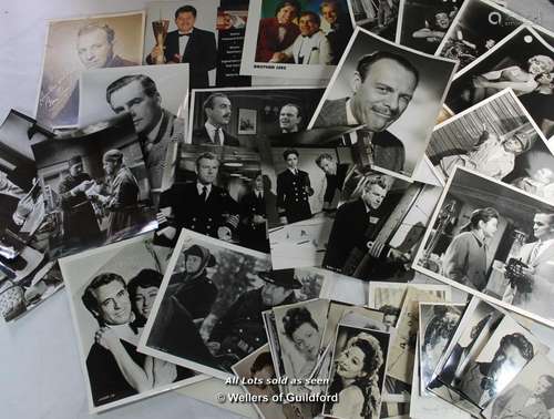 A quantity of black and white film stills including stars such as Marylin Monroe, Norman Wisdom,