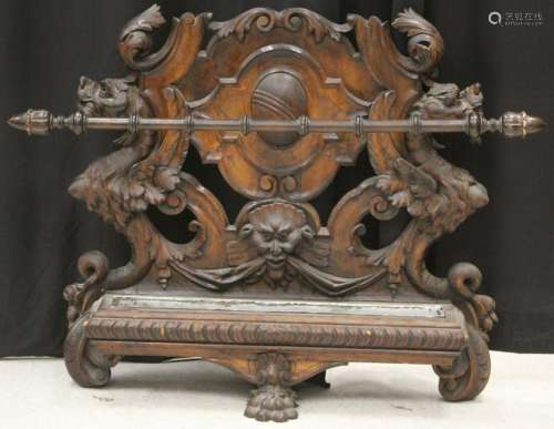 19TH. CARVED WALNUT WINGED GRIFFIN UMBRELLA STAND