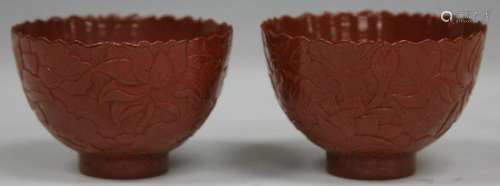 PAIR OF CHINESE SCULPTED POTTERY TEA CUPS