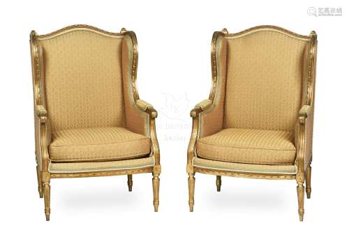 PAIR OF LOUIS XVI GILTWOOD CARVED WING CHAIRS