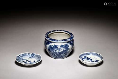 A BLUE AND WHITE JAR AND TWO DISHES