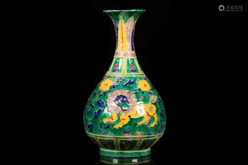 GREEN GLAZED AND CARVED 'MYTHICAL BEASTS' VASE