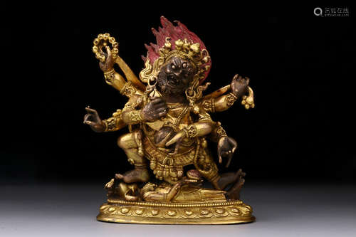 GILT BRONZE SIX-ARM BUDDHA ORNAMENT