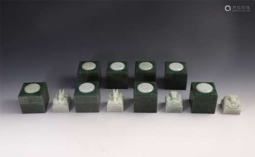 EIGHT CHINESE WHITE JADE DRAGON SEALS IN SPINACH JADE CASE
