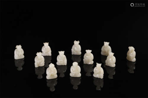 TWEELVE CHINESE JADE ZODIACIAL ANIMAL TABLE ITEMS