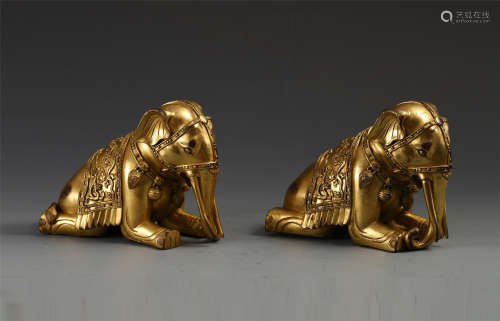 PAIR OF CHINESE GILT BRONZE ELEPHANT TABLE ITEMS
